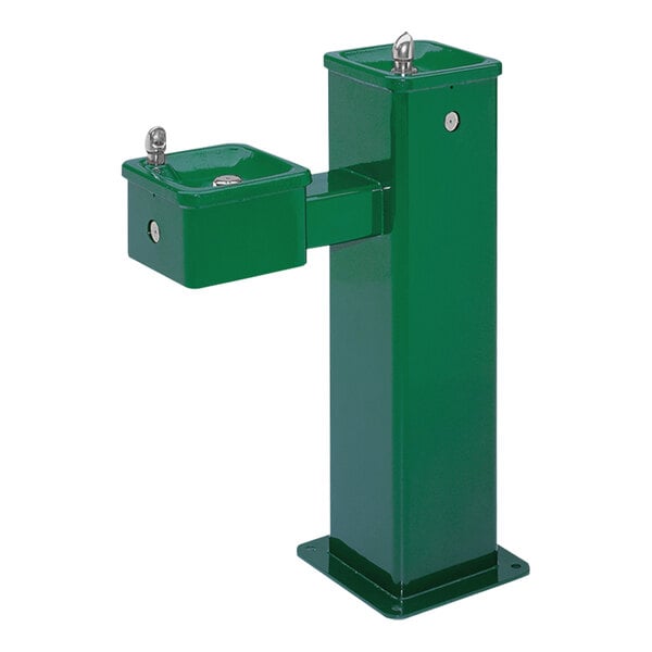 A green Haws outdoor pedestal drinking fountain with a green base.