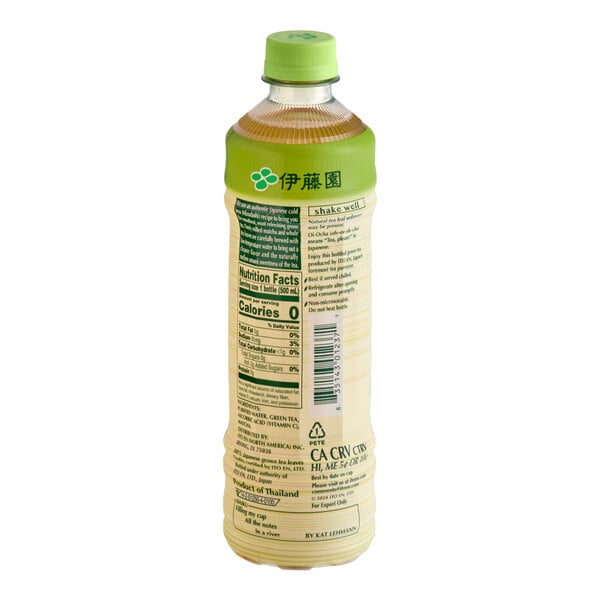 A plastic bottle with a green cap and green label, containing a light brown liquid and featuring nutrition facts and text in both English and Japanese.