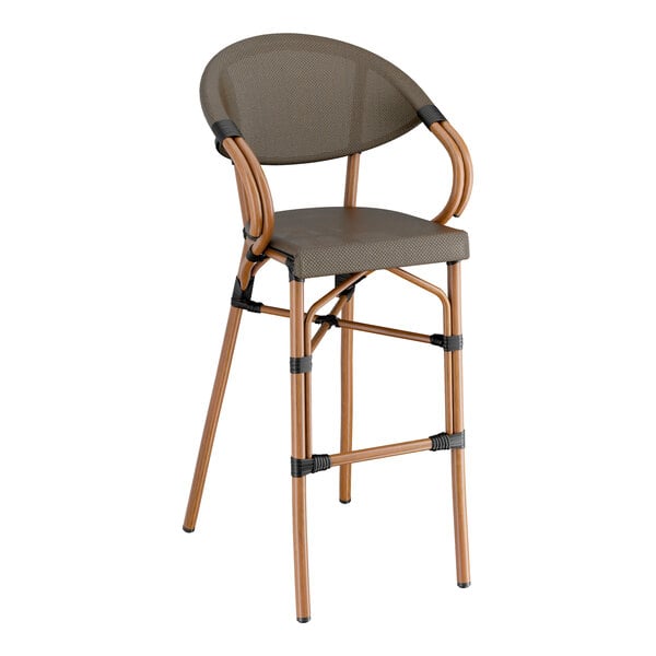 A Lancaster Table & Seating brown Teslin outdoor arm barstool with a wooden frame and cushioned seat.