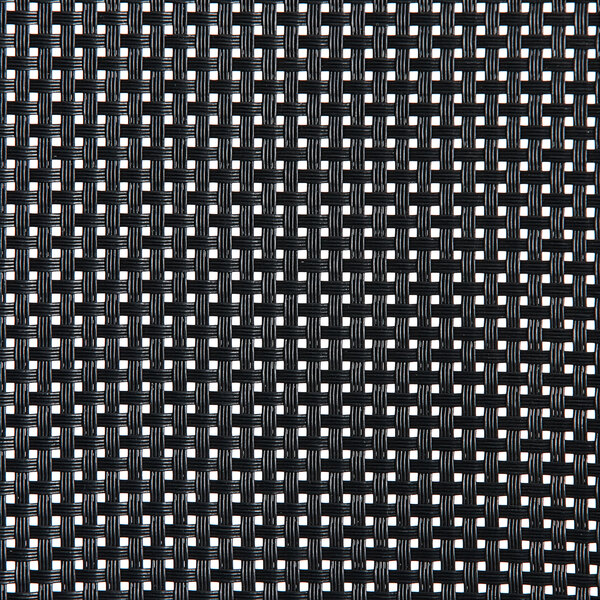 A close up of a black and white woven fabric with white dots.