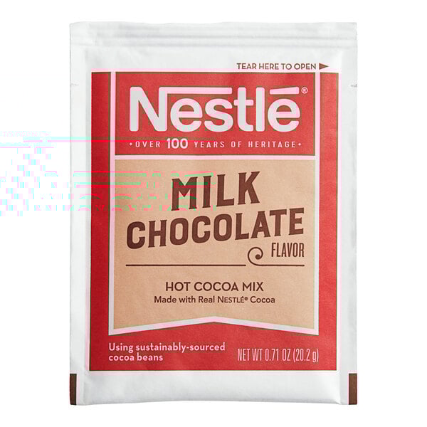 A white and red Nestle Milk Chocolate Hot Cocoa mix packet.