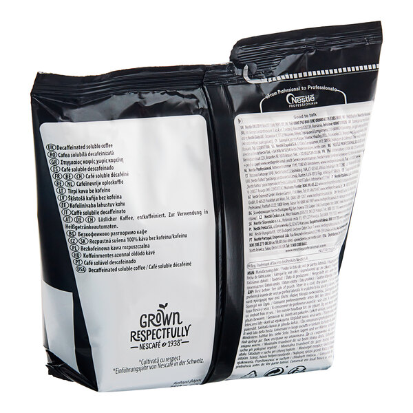 A black and white Nescafe Ristretto Decaf Instant Coffee pouch with white text.