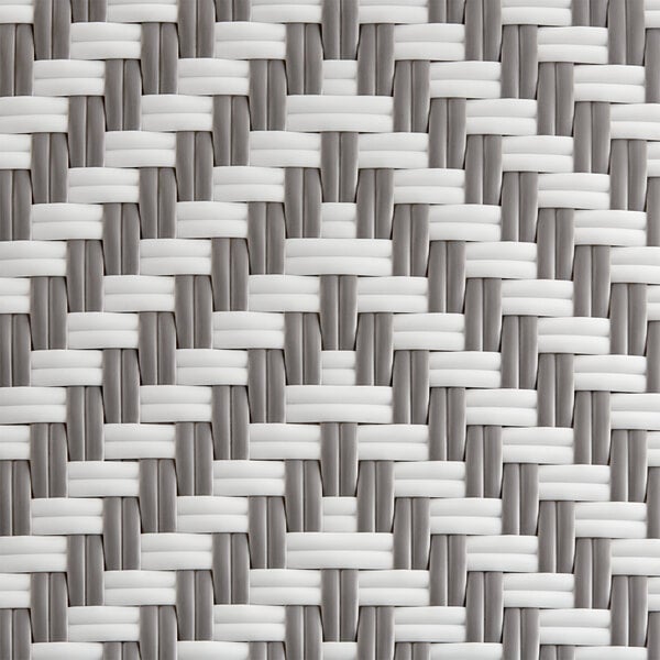 The woven white and gray rattan surface of a Lancaster Table & Seating outdoor side chair.