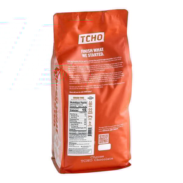 A bag of TCHO Crush This Cacao Nibs on a white background.