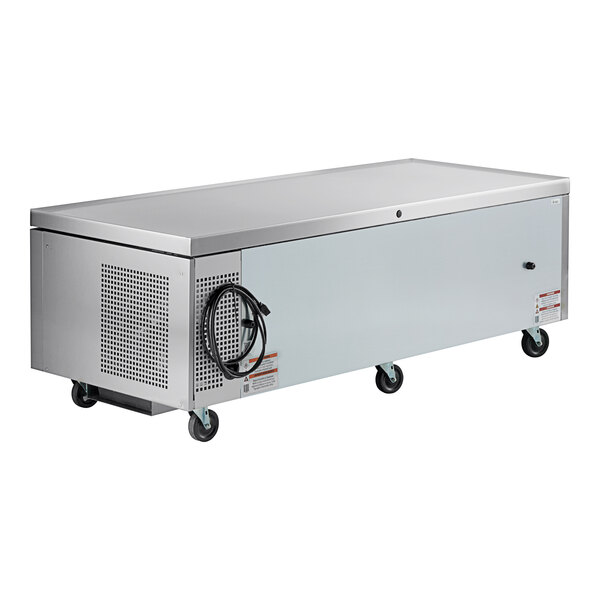 A large stainless steel refrigerated chef base with four drawers and caster wheels.