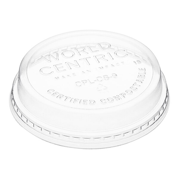 A clear plastic World Centric dome lid with text on it.