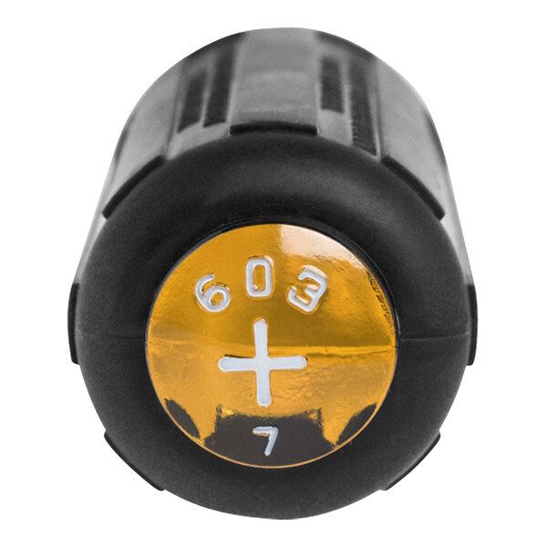 A black and gold cylinder with a white cross and the number 2 on it.