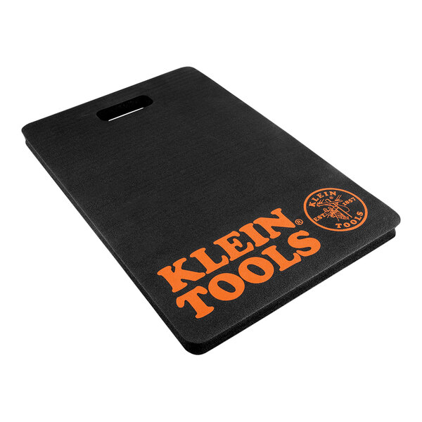 A black Klein Tools kneeling pad with an orange Klein Tools logo.
