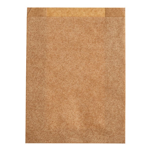 A brown paper bag with Lavex Sanitary Napkin Receptacle Bags in a brown envelope.