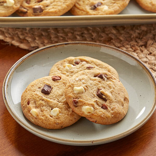 A plate of Otis Spunkmeyer Triple Chocolate cookies.