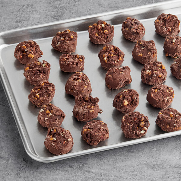 A tray of Otis Spunkmeyer chocolate turtle cookies.