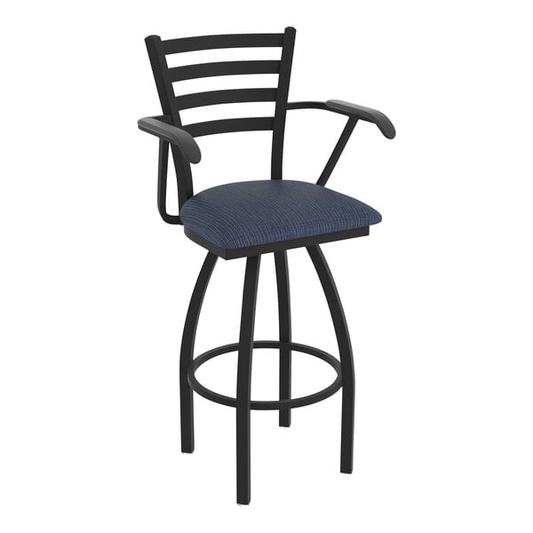 A black Holland Bar Stool with arms and a blue Graph Anchor fabric cushion.