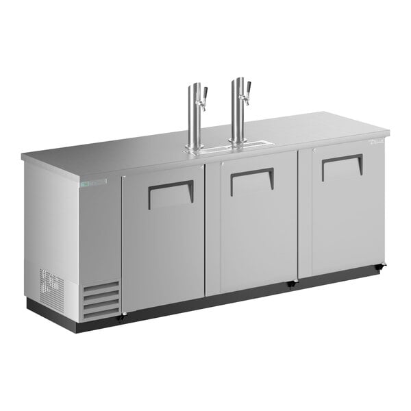 A stainless steel counter with two taps and two doors.