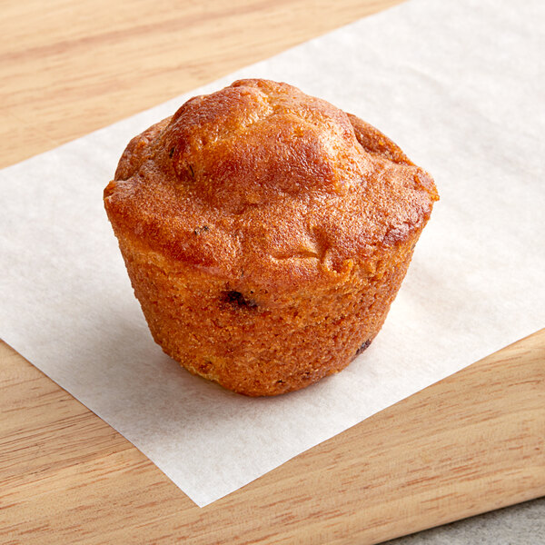 An individually wrapped Katz Gluten-Free Zucchini Blueberry Muffin on a paper towel.