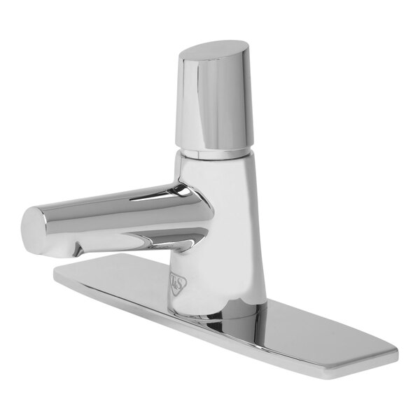 A silver LakeCrest metering faucet with a push button cap and deck plate.