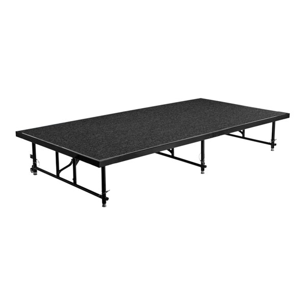 A National Public Seating black rectangular stage platform with metal legs.