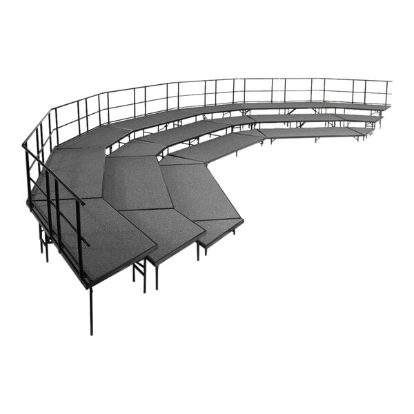 A National Public Seating gray choral riser set with metal guardrails.