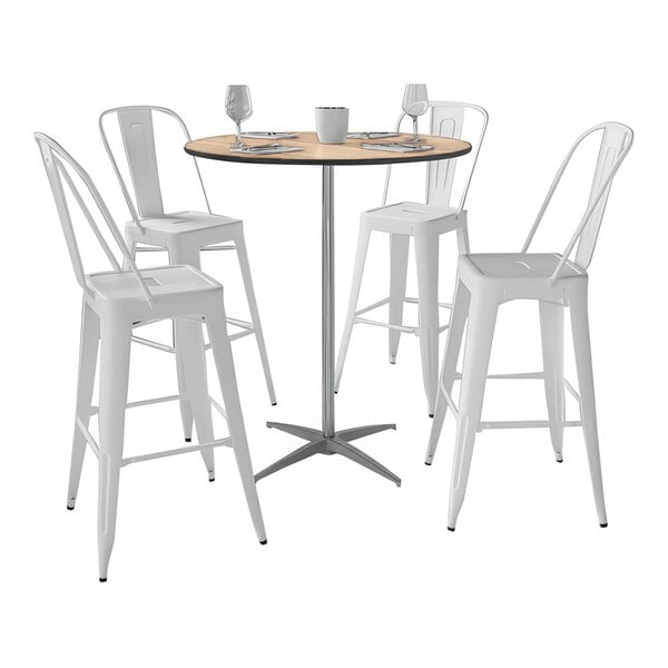 A close up of a Flash Furniture birchwood cocktail table with white legs.