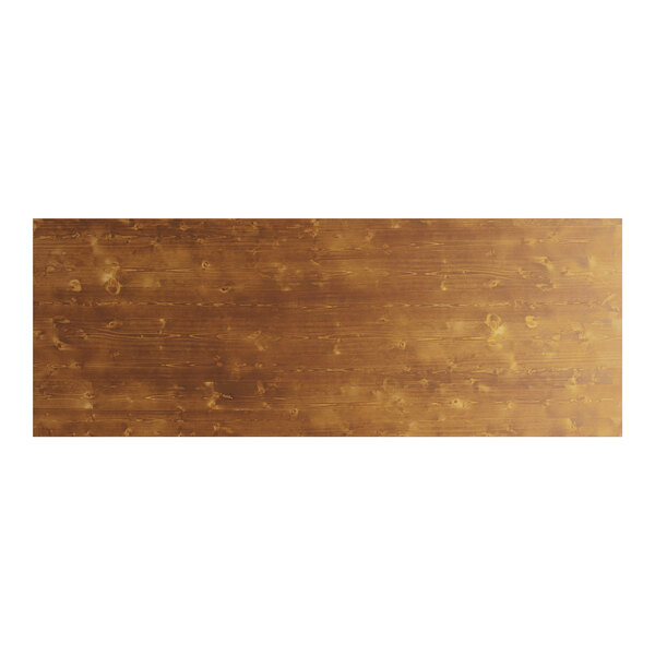 A brown rectangular Lancaster Table & Seating outdoor table top with knots.