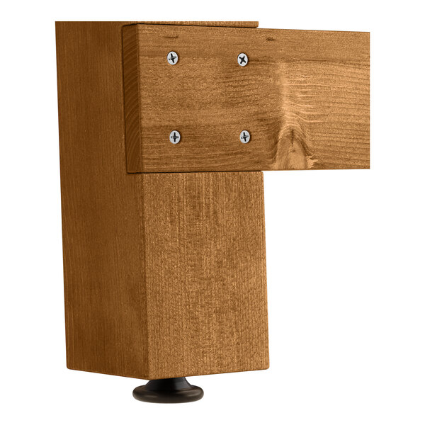 A Lancaster Table & Seating Vineyard Series outdoor table set with wood surfaces and black bases.