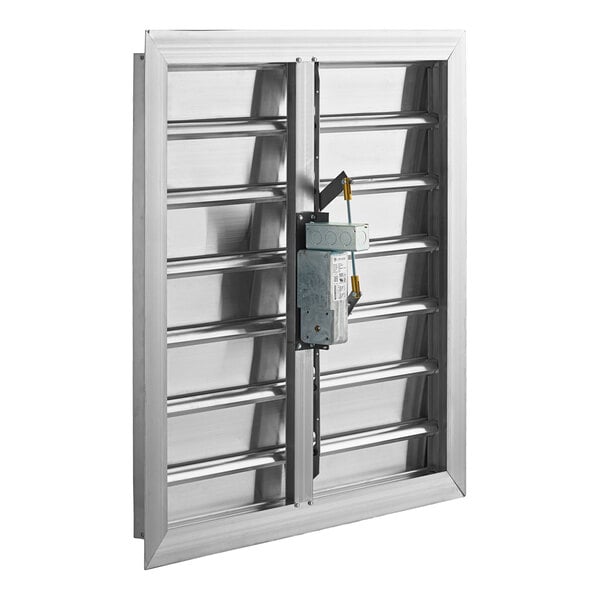 A metal box with a Canarm 3200 series metal motorized shutter inside.