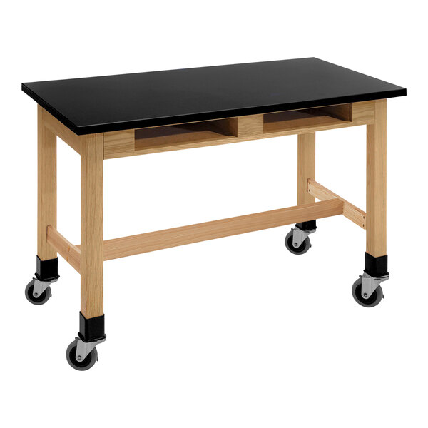 A black wood science lab table with casters.