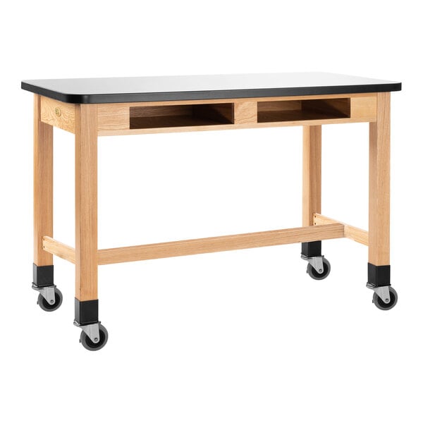 A black and white wood science lab table with casters.