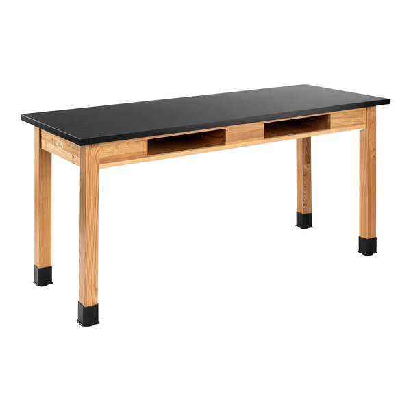 A black wood National Public Seating science lab table with a black Trespa top.