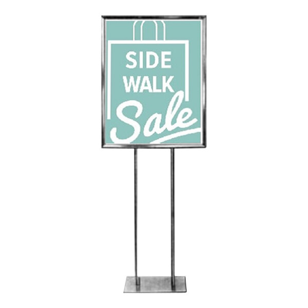 A chrome bulletin sign holder with a sign that says "Side Walk Sale" on it and a black pole.