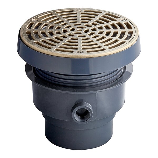 A Sioux Chief PVC floor drain with a round nickel bronze strainer.