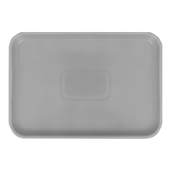 A close-up of a gray rectangular Torino Tavern ceramic tray on a white surface.