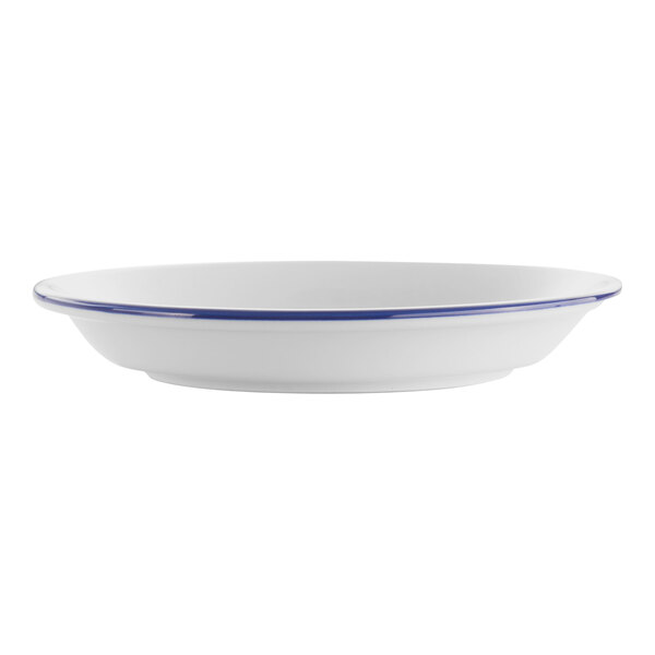 A white porcelain saucer with a blue rim.