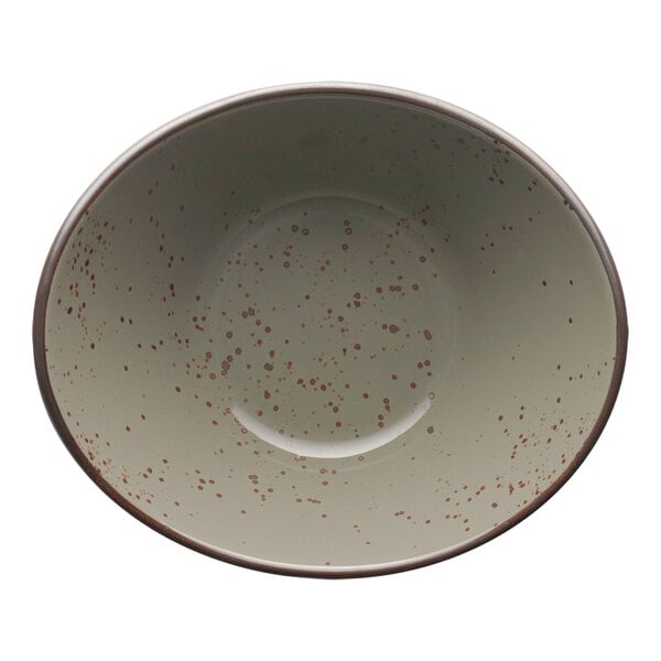 An International Tableware oval stoneware bowl with speckled green smoke finish.