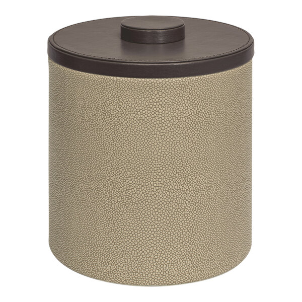 A round beige and brown Room360 ice bucket with a round brown lid.