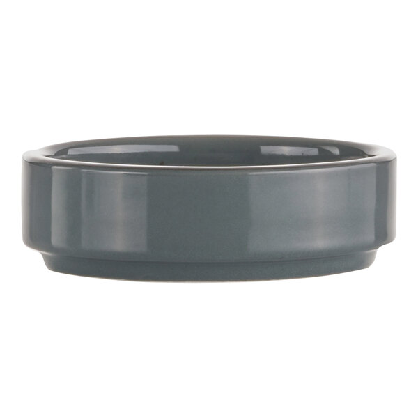 A grey International Tableware stoneware sauce dish.