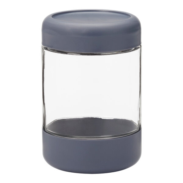 An Anchor Hocking clear glass jar with a grey threaded lid on a kitchen counter.