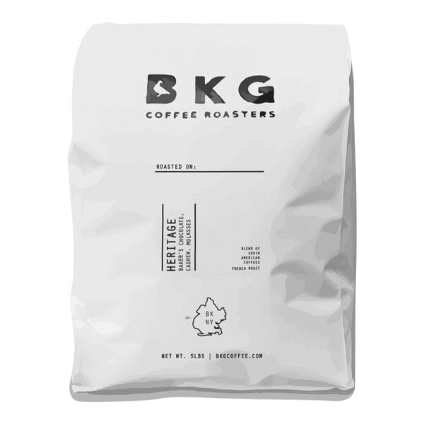 A white bag of BKG Heritage Whole Bean Coffee with the BKG Coffee Roasters logo.