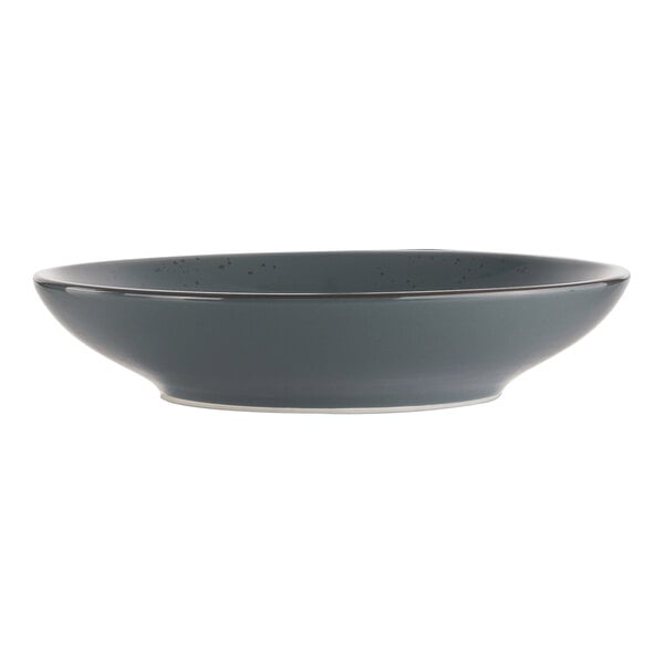 A grey stoneware bowl with specks and a black rim.
