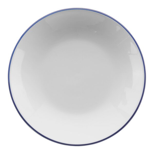 A white porcelain pasta bowl with a blue rim.