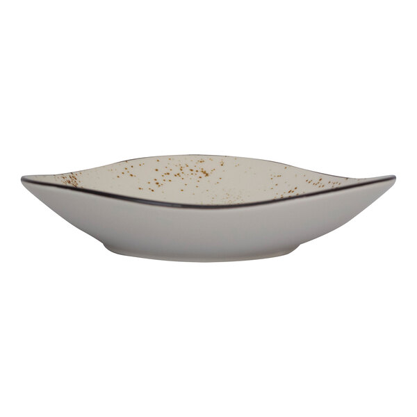 A white triangular stoneware bowl with brown speckles.