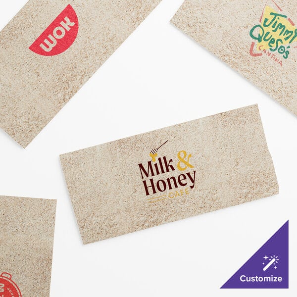 A group of Choice Touchstone Beige paper guest towels with a close-up of the linen texture.