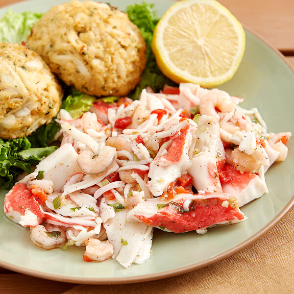 A plate of Don's Salads crab seafood salad with a lemon wedge.