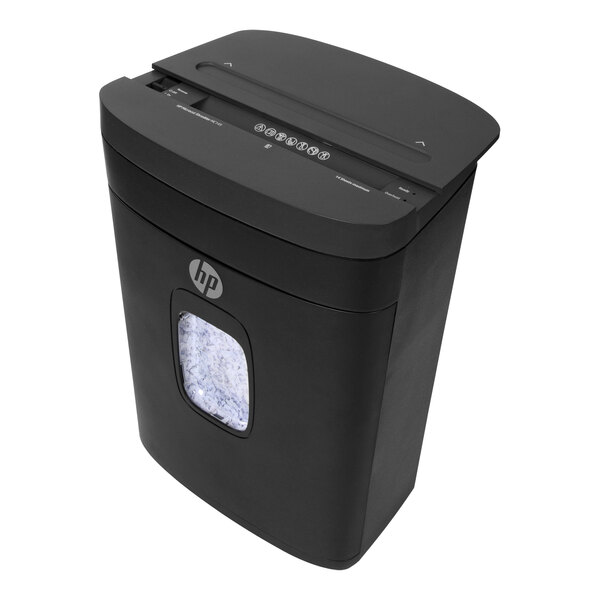 An HP micro-cut paper shredder with a black cover.