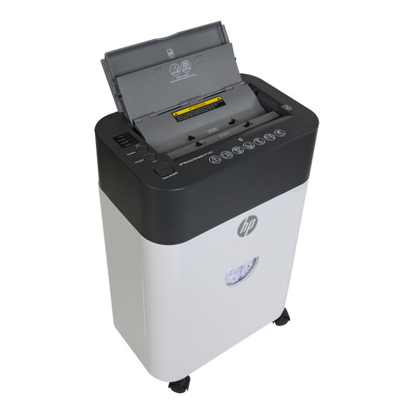A HP micro-cut paper shredder with the lid open.