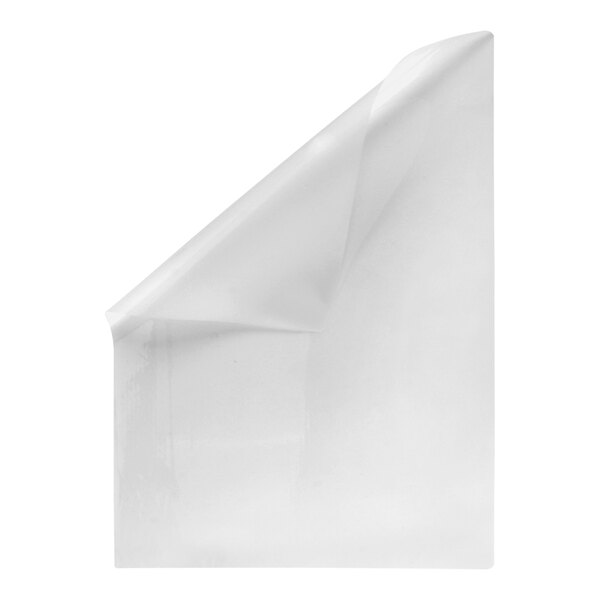 A close-up of a white sheet of paper with a curled corner.