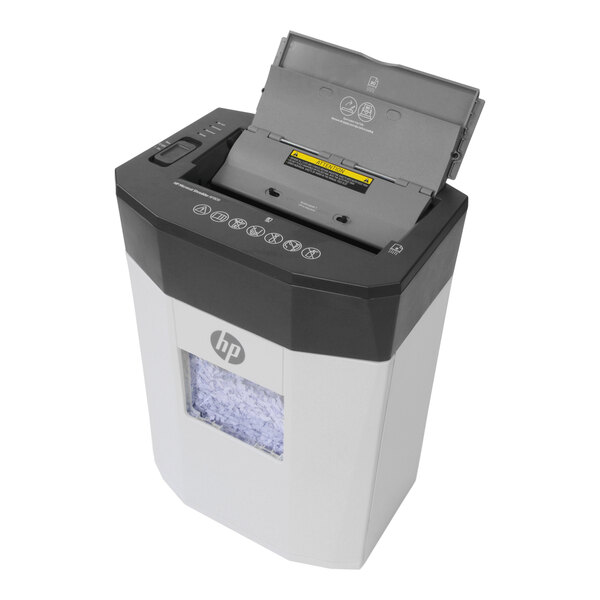 A white HP micro-cut paper shredder with the lid open.