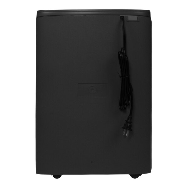 A black rectangular object with a black electrical cord on a rectangular surface.