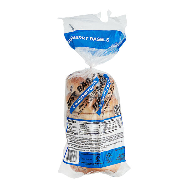 A plastic bag of Just Bagels blueberry bagels.