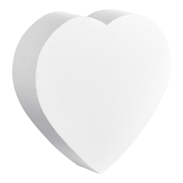 A white heart shaped Baker's Lane cake dummy.