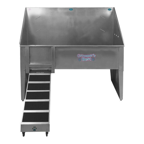 A stainless steel metal walk-through dog bathing tub with a center drain and left ramp.